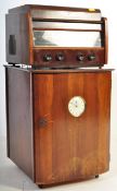 A 1930'S ART DECO WALNUT RECORD PLAYER RADIOGRAM ON STAND