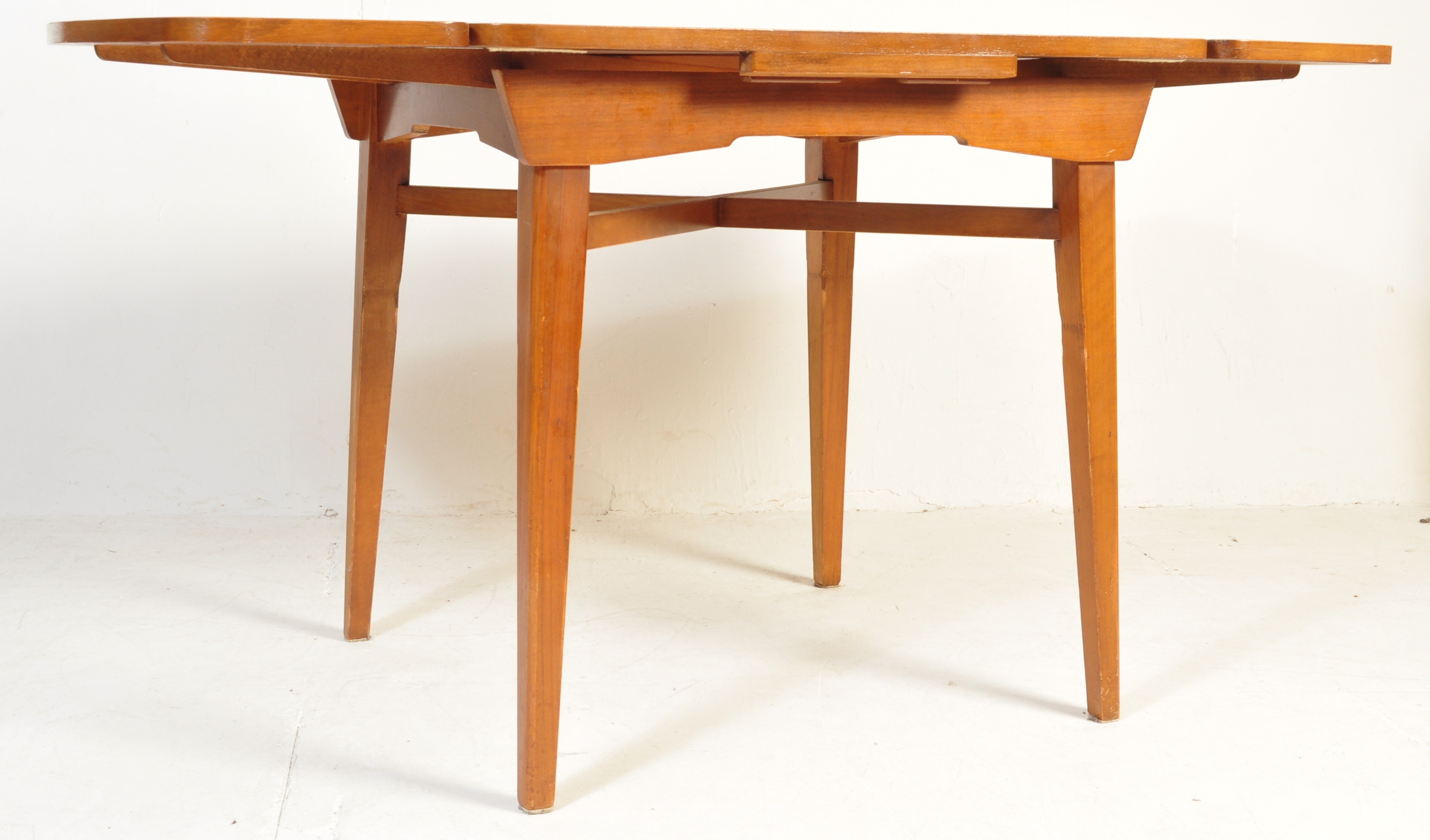 PARKER KNOLL TEAK EXTENDABLE DINING TABLE AND CHAIRS - Image 5 of 14