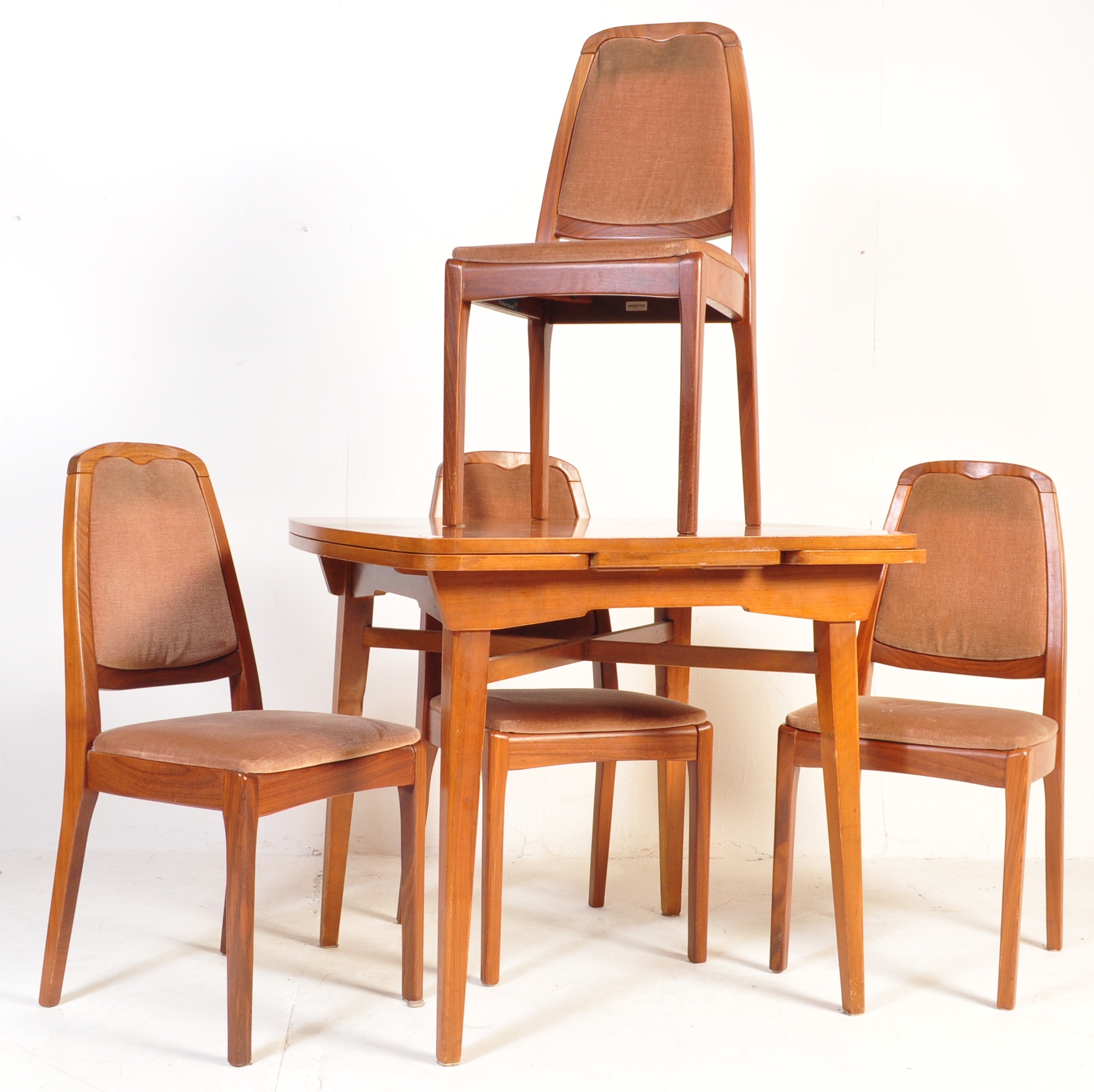 PARKER KNOLL TEAK EXTENDABLE DINING TABLE AND CHAIRS