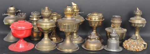 LARGE COLLECTION OF EARLY 20TH CENTURY BRASS OIL LAMPS