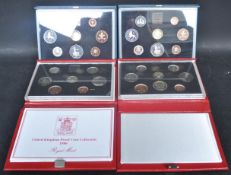 COLLECTION OF FOUR ROYAL MINT DELUXE PROOF COIN SETS