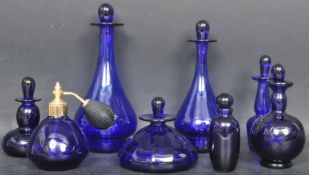 COLLECTION OF BRISTOL BLUE COBALT GLASS BOTTLES