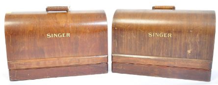 TWO VINTAGE SINGER SEWING MACHINES WITH OAK CARRY CASES