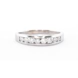 10CT WHITE GOLD & DIAMOND HALF ETERNITY RING