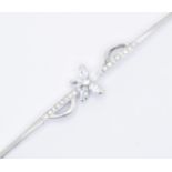 9CT WHITE GOLD FLOWER CLUSTER BRACELET