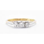 18CT GOLD & PLATINUM THREE STONE DIAMOND RING