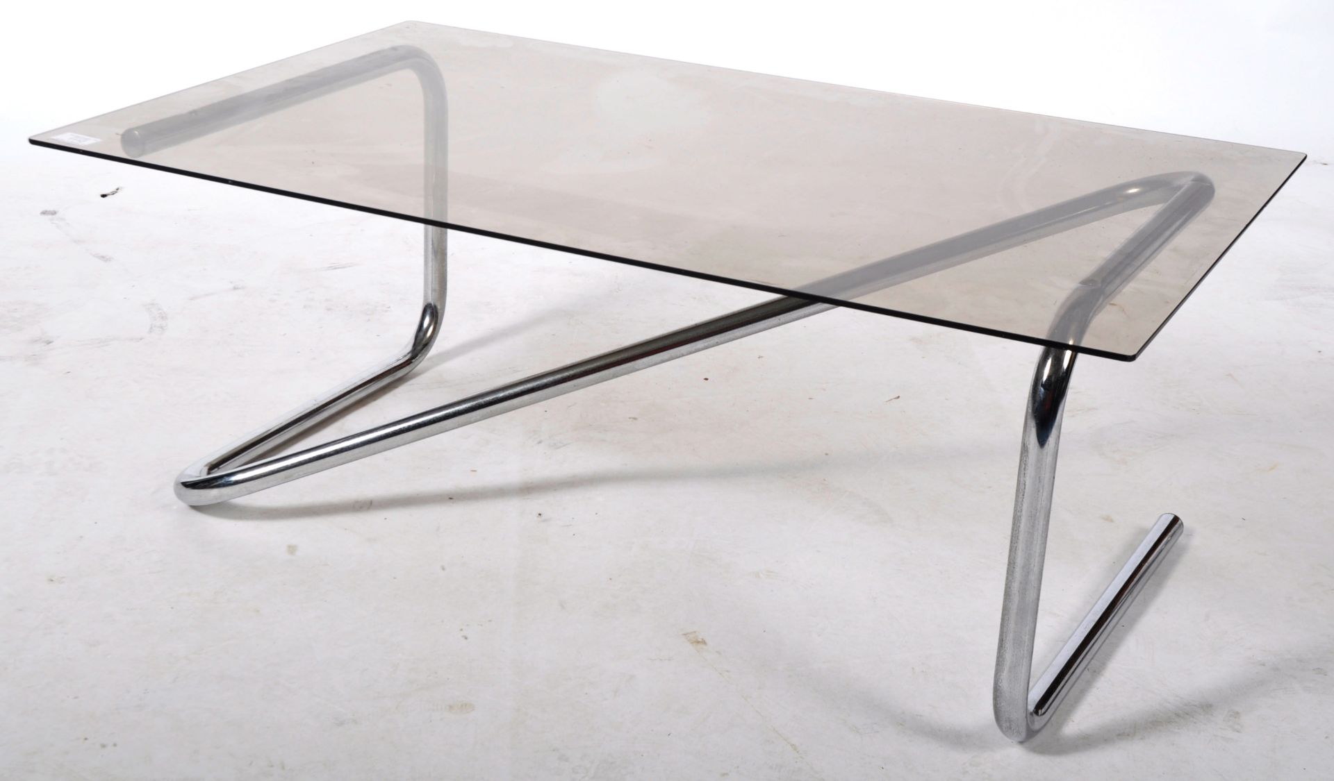 1970'S CHROME AND SMOKED GLASS TOPPED COFFEE TABLE