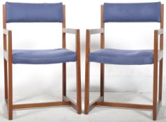 GUY ROGERS - PAIR OF TEAK FRAMED CUBIST CARVER / OFFICE ARMCHAIRS