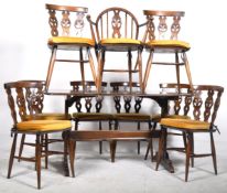 ERCOL - FLEUR DE LYS - DINING TABLE AND NINE CHAIRS (ONE CARVER)