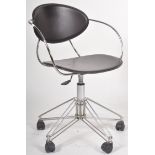 BROWN LEATHERETTE DESK CHAIR ON CHROME SUPPORTS