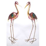 MATCHING PAIR OF PAINTED PRESS METAL GARDEN CRANES