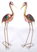 MATCHING PAIR OF PAINTED PRESS METAL GARDEN CRANES