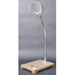 VINTAGE MAGNIFYING GLASS ON STAND - PHILLIP HARRIS & CO
