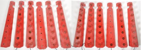 SET OF TWELVE FAIRGROUND LIGHT STRIP PANELS IN RED