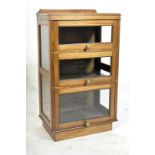 EARLY 20TH CENTURY OAK AND GLASS DISPLAY CABINET / BOOKCASE