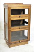 EARLY 20TH CENTURY OAK AND GLASS DISPLAY CABINET / BOOKCASE