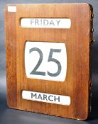 OAK CASED WALL MOUNTED PERPETUAL CALENDAR