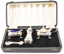 MID 20TH CENTURY STERLING SILVER CRUET SET IN FITTED BOX