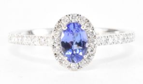 HALLMARKED PLATINUM TANZANITE & DIAMOND RING