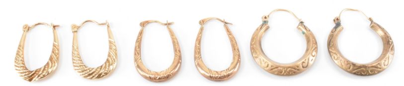 THREE PAIRS OF GOLD HOOP EARRINGS