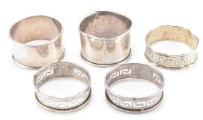 FIVE SILVER HALLMARKED NAPKIN RINGS