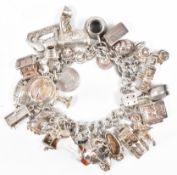 VINTAGE SILVER CHARM BRACELET WITH SILVER & WHITE METAL CHARMS