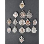 COLLECTION OF EARLY 20TH CENTURY HALLMARKED SILVER FOB MEDALS