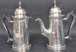 TWO EARLY 20TH CENTURY COFFEE & HOT WATER POTS