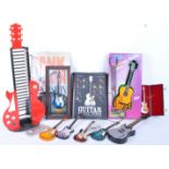 COLLECTION OF VINTAGE 20TH CENTURY GUITAR RELATED CURIOS