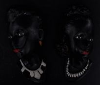 TWO 20TH CENTURY ART DECO BLACKAMOOR EBONISED WALL PLAQUES