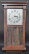 EARLY 20TH CENTURY MAHOGANY CASED WALL CLOCK