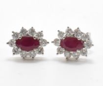 PAIR OF WHITE GOLD DIAMOND & RUBY CLUSTER EARRINGS