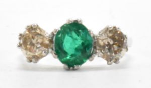 WHITE GOLD EMERALD & DIAMOND THREE STONE RING