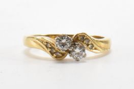 HALLMARKED 18CT GOLD & DIAMOND CROSSOVER RING