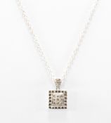 WHITE GOLD & DIAMOND PENDANT & SILVER NECKLACE