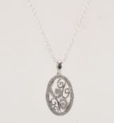 WHITE GOLD & DIAMOND PENDANT WITH SILVER CHAIN NEC