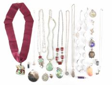 ASSORTMENT OF SILVER PENDANTS & NECKLACES