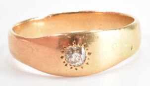 A GOLD & ROUND OLD CUT GYPSY RING