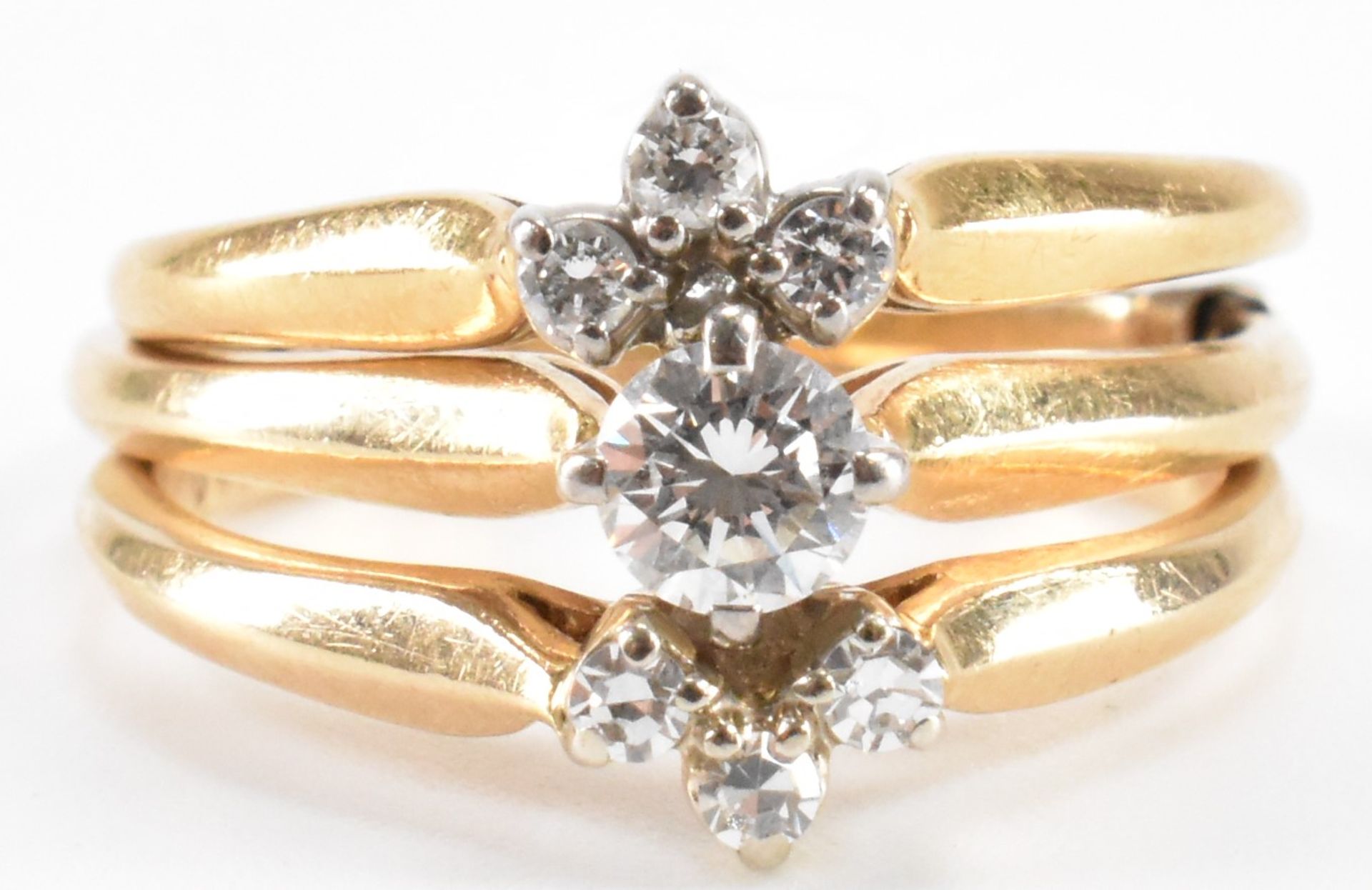 THREE VINTAGE GOLD & DIAMOND STACKING RINGS