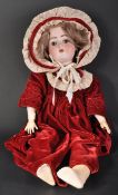 EARLY 20TH CENTURY GERMAN BISQUE HEADED DOLL