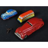 COLLECTION OF X3 VINTAGE TINPLATE CLOCKWORK CARS