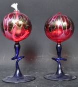 PAIR OF HAND BLOWN STUDIO GLASS OIL BURNERS