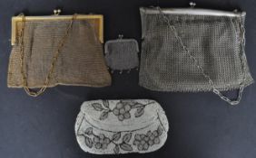 FOUR EARLY 20TH CENTURY SILVER MESH & METAL PURSES.