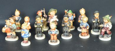 A COLLECTION OF VINTAGE GOEBEL CHILDREN PORCELAIN FIGURINES