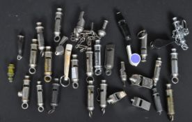 A COLLECTION OF VINTAGE METAL & PLASTIC WHISTLES