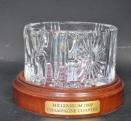 A VINTAGE WATERFORD CRYSTAL MILLENNIUM CHAMPAGNE COASTER