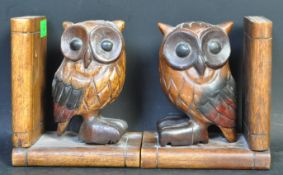 A PAIR OF VINTAGE HAND CARVED HARDWOOD OWL BOOK ENDS