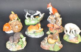 A COLLECTION OF FRANKLIN PROCELAIN WOODLAND FIGURINES