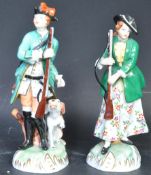 A PAIR OF VICTORIAN GERMAN DRESDEN CHINA HUNTING FIGURES