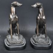 PAIR OF 20TH CENTURY RESIN FAUX BRONZE GREYHOUND FIGURES